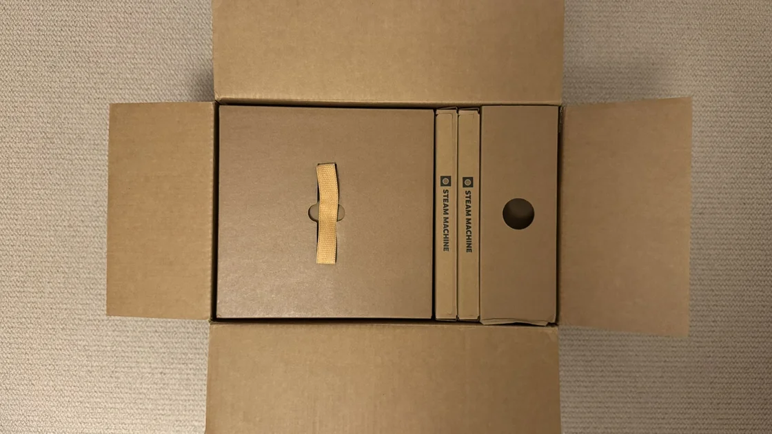 Photograph of the Steam Machine boxes as they arrive for shipping, outer box only opened, top down