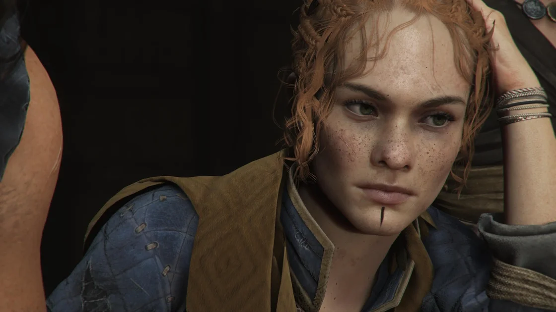 Resonance: A Plague Tale Legacy screenshot showing a freckled, ginger-haired young thief Leni with a contemplative expression