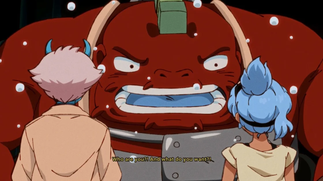 Orbitals screenshot showing Maki and Omi looking at a big red catfish alien weirdo