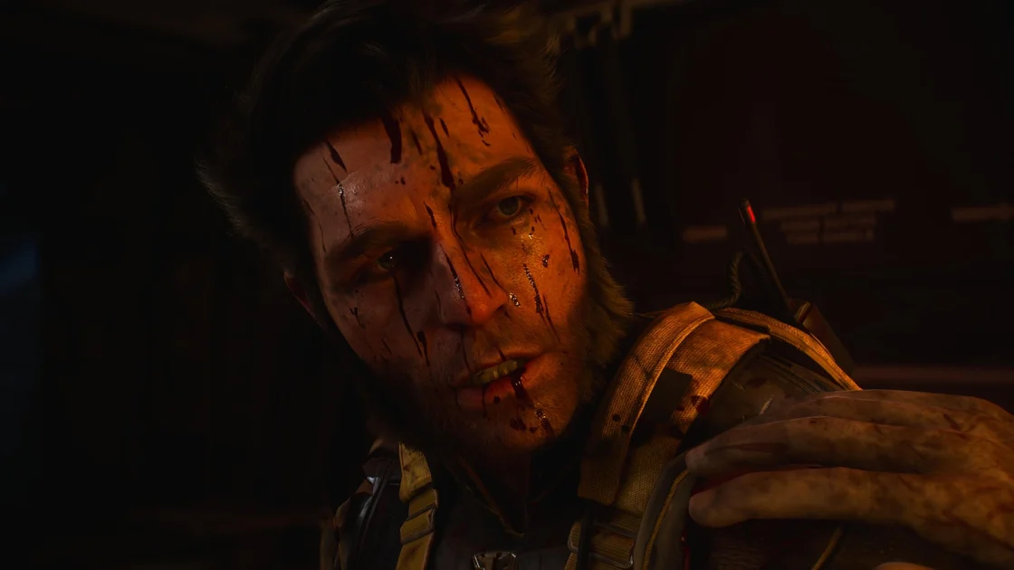 Marvel's Wolverine screenshot showing Wolverine with blood on his face looking surprised