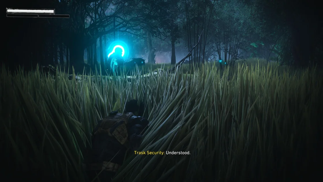 Marvel's Wolverine screenshot showing Wolverine sneaking through long grass