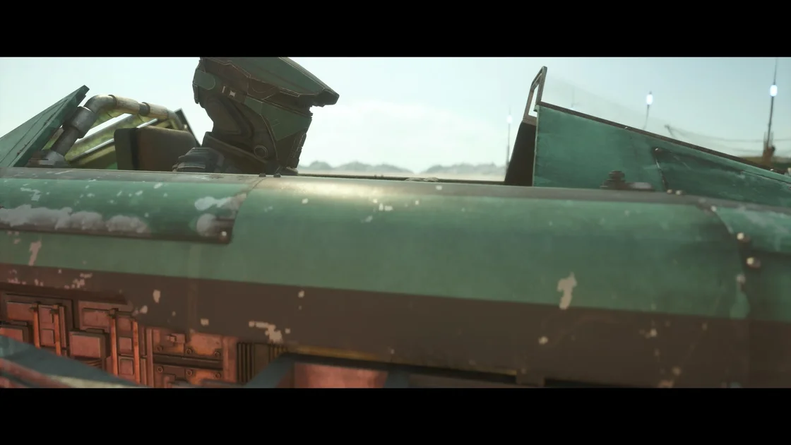 Star Wars: Galactic Racer screenshot showing you in the cockpit of a green racer, side on, looking cinematically determined