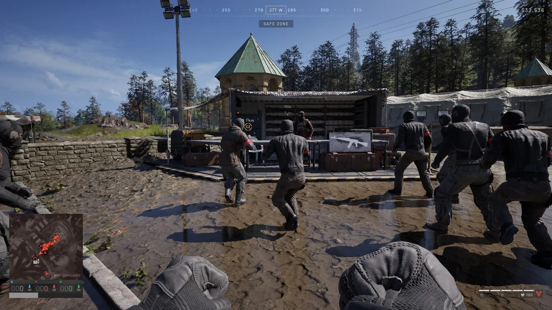 A screenshot of Wardogs, showing players gathered round the weapons vendor at the outset of a match.