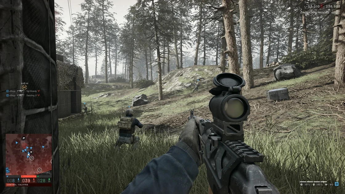 A Screenshot of Wardogs, showing the player moving alongside a wall with several other players.