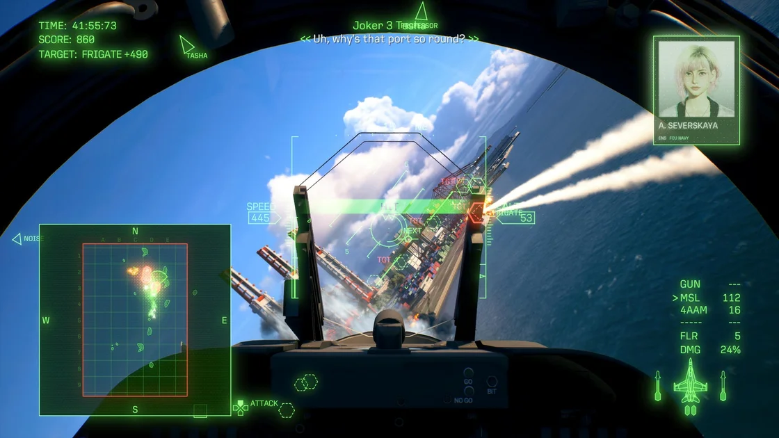 Ace Combat 8: Wings of Theve screenshot showing a cramped first-person cockpit view, within which you can see several ground targets marked with green hexagons and two missiles heading toward one of them.